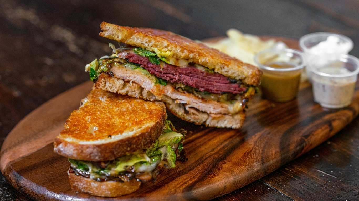 Cactus Club burgers and handheld menu